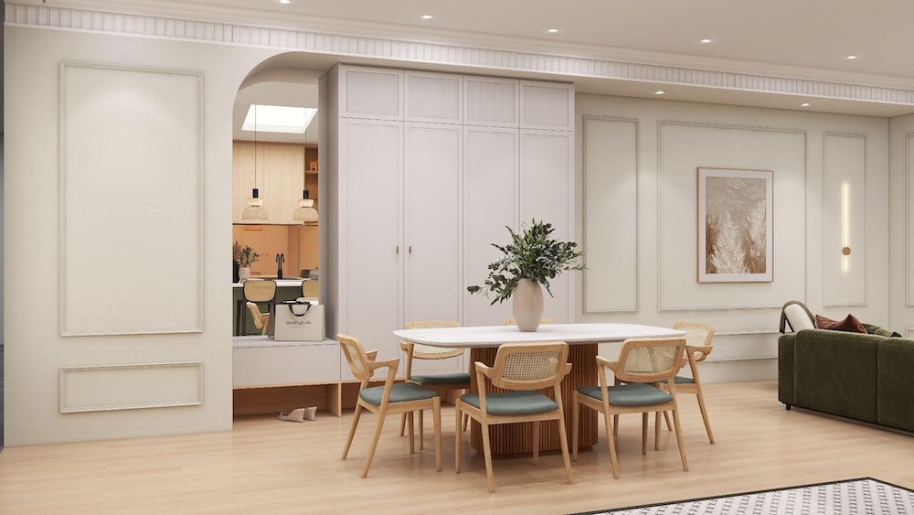 Dining area with picture frame wainscoting on the surrounding walls.
